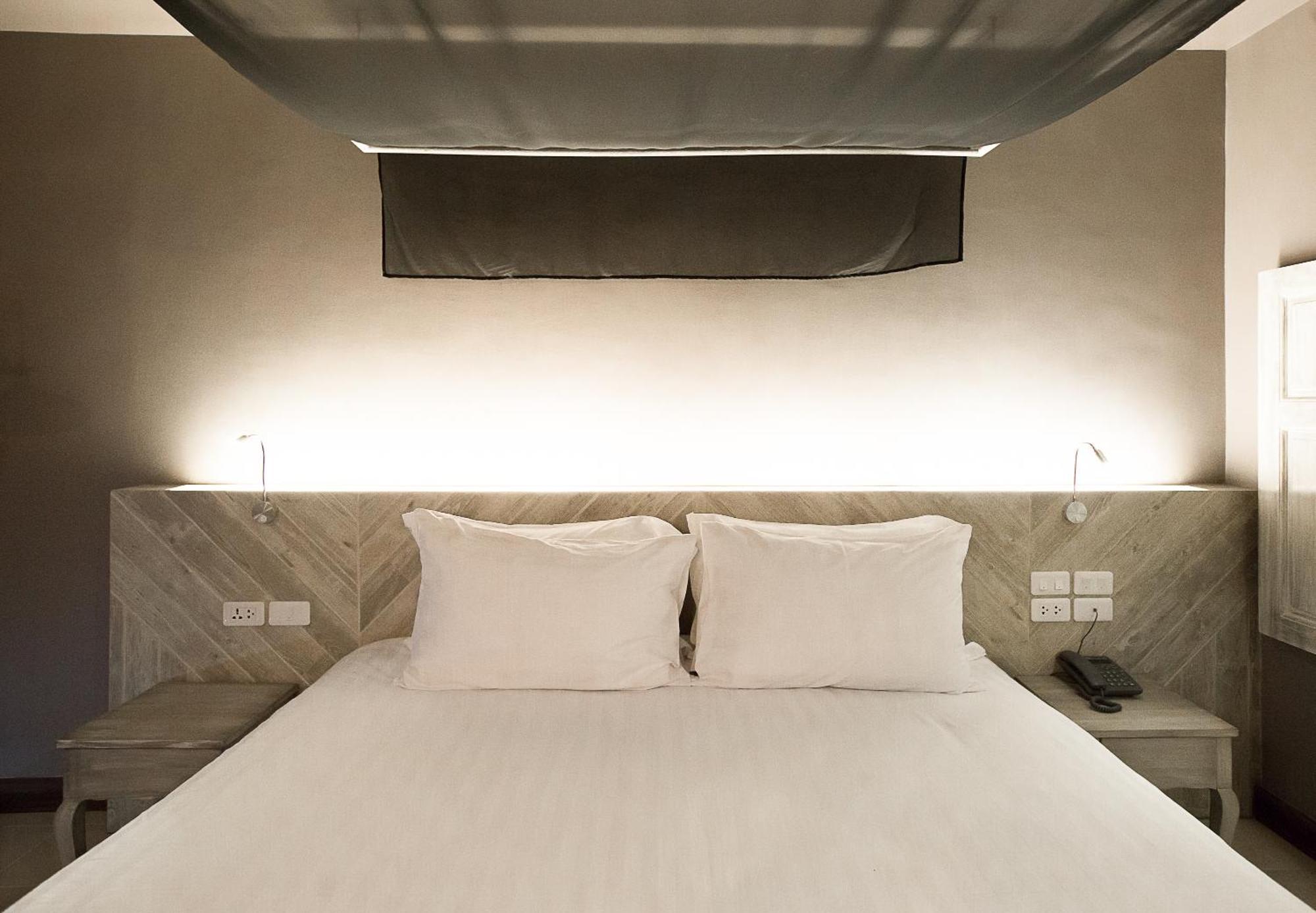 Art Mai Gallery Nimman Hotel Τσιάνγκ Μάι Εξωτερικό φωτογραφία A bed